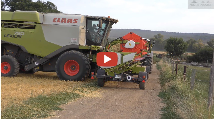 Einen Neun Claas Lexion Mit Einem Vario Schneidwerk Und Horsch